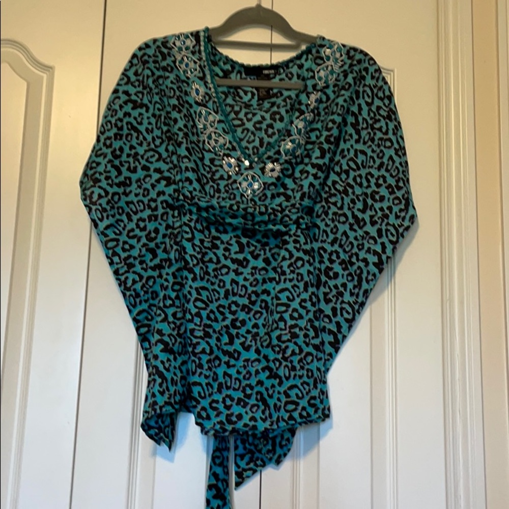 A blue leopard print loose fitted beaded top Sz. S